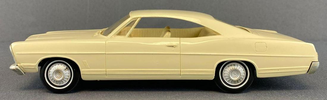 AMT 1967 Ford 428 XL Dealership Promo Car: 2 1/2 x 8 1/2 inches. Friction does work.