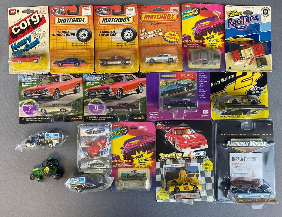 Group of 18 Assorted Die-Cast Vehicles: Includes Matchbox T-Bird Turbo Coupe, Kelloggs Rice Krispies Car, Racing Champions Michael Waltrip Car, and more. Majority in original packaging.
