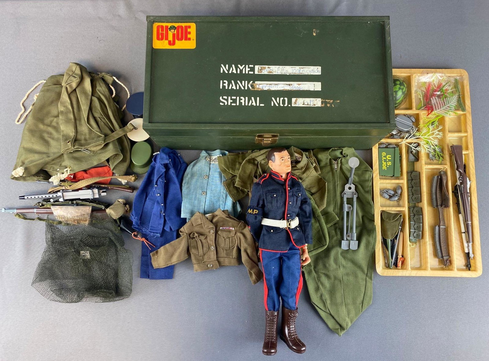 GI Joe Action Figure Accessory Kit with Doll: Includes clothes, guns, grenades, and more.