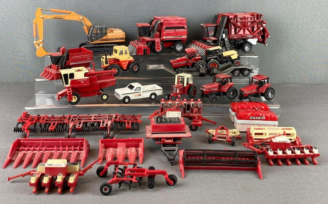 Group of ERTL Die Cast Case Tractors and Farm Equipment: includes hydrostatic 815, 7210, 1844, 1470, and more