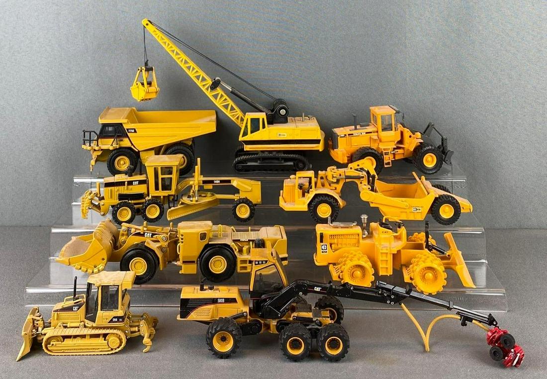 Group of Caterpillar Die Cast Vehicles: includes 225, D5G XL, 580B, R1700G, and more