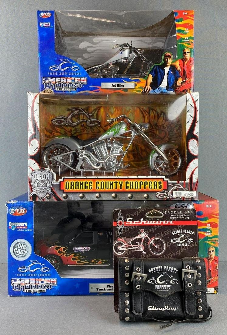 Group of 3 Orange County Choppers Die Cast Vehicles: includes schwinn saddle bag, in original boxes. includes Fire bike truck and chopper set, jet bike, and occ softails