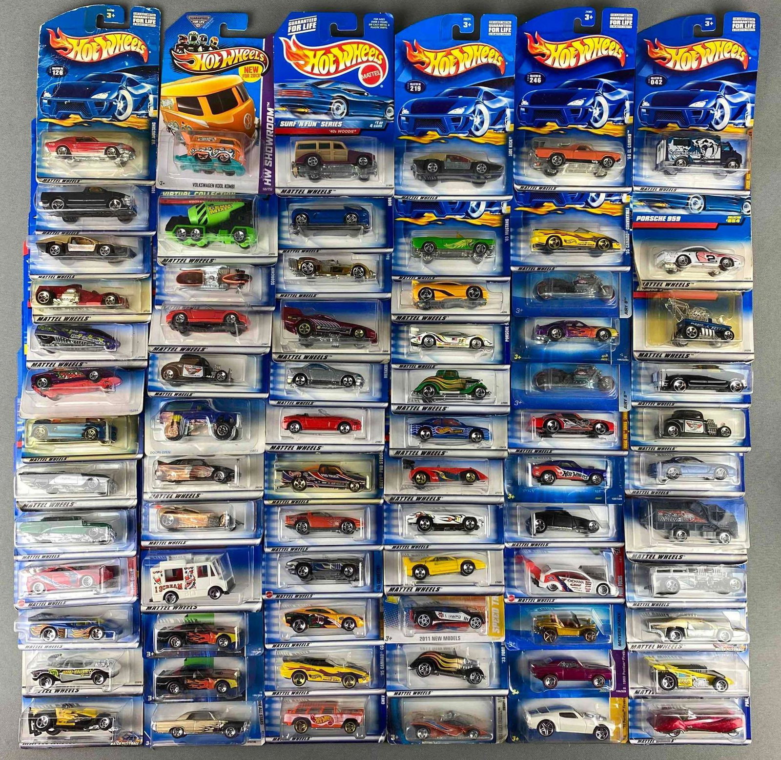 Group of Mattel Hot Wheels Die Cast Vehicles: in original packaging. includes 1933 Ford Roadster, 1963 T-bird, 1965 Mustang, 1932 ford, and more