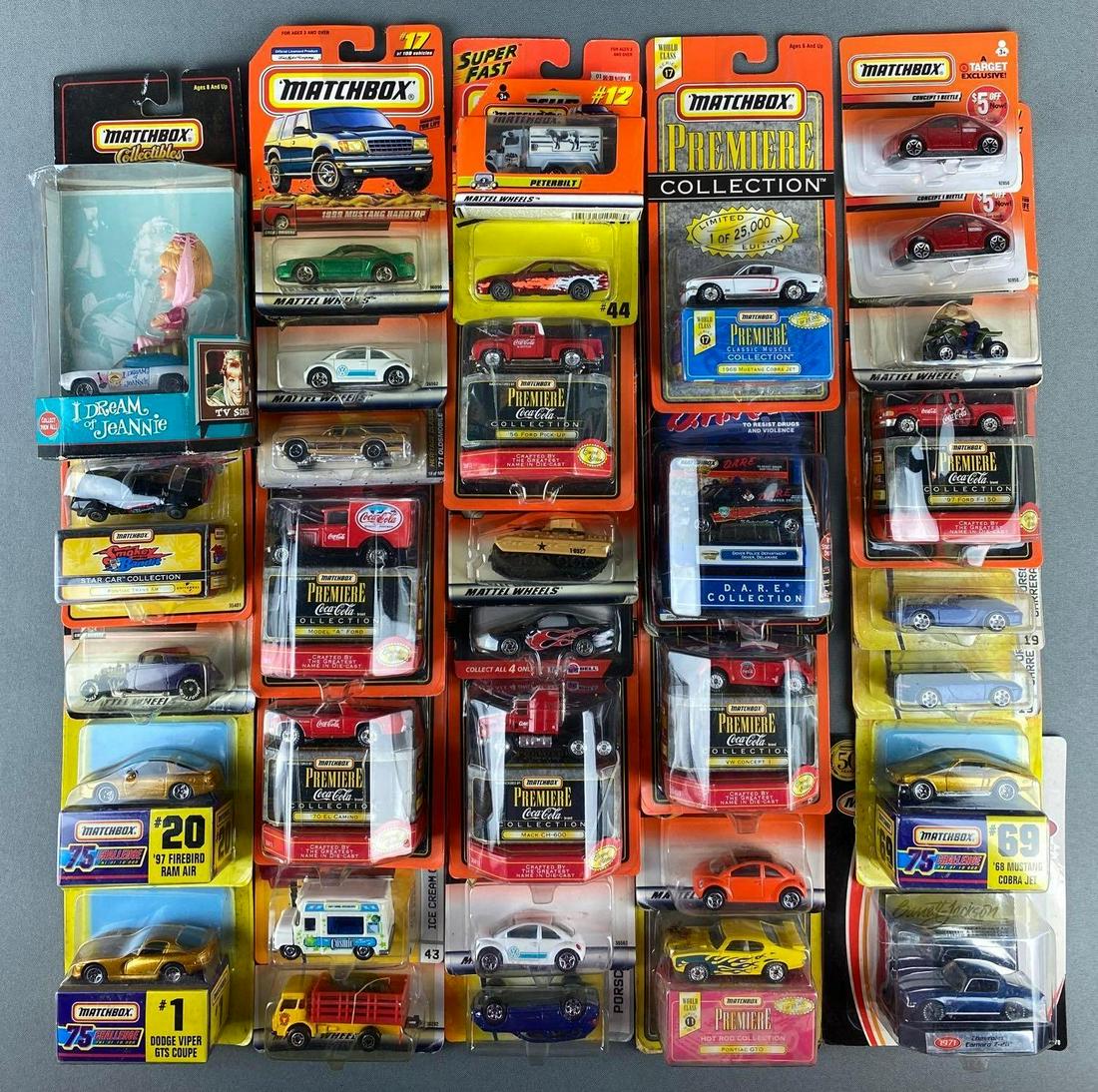 Group of Matchbox Die Cast Vehicles: in original packaging. includes 1968 mustang cobra jet, Dodge Viper GTA Coupe, Chevrolet Camaro Z28, 1971 Oldsmobile vista cruiser, and more