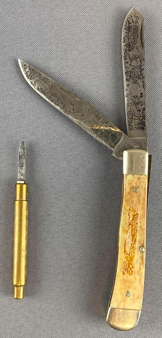 Group of 2 Pocket Knives: Includes engraved moon shiner (serial No. 8147) and automatic eagle bullet pocket knife. Largest is 7 1/2 inches long.
