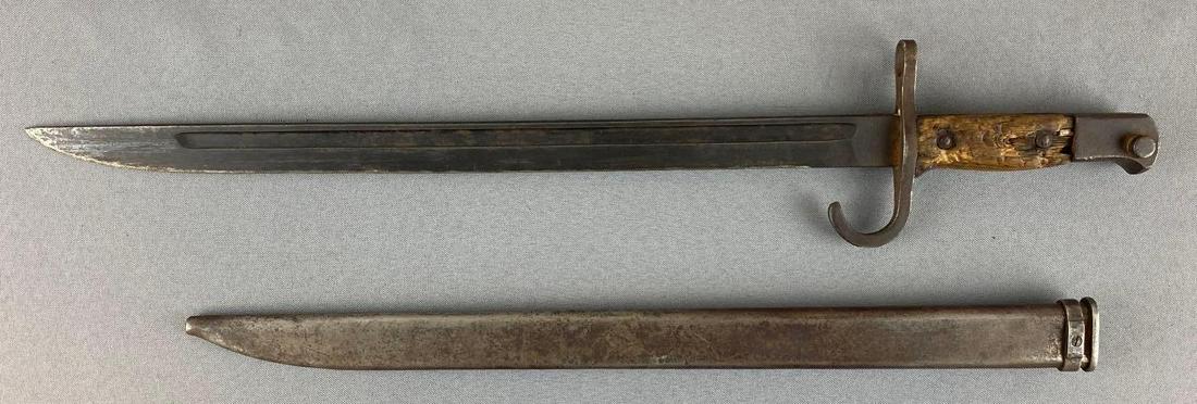 WW2 Japanese Arisaka Rifle Bayonet: Japanese Jinsen Rikugan Zohheisho Bayonet. Wood hilt. Some rust on blade. 20 inches long with sheathe, blade is 16, hilt is 4 inches.