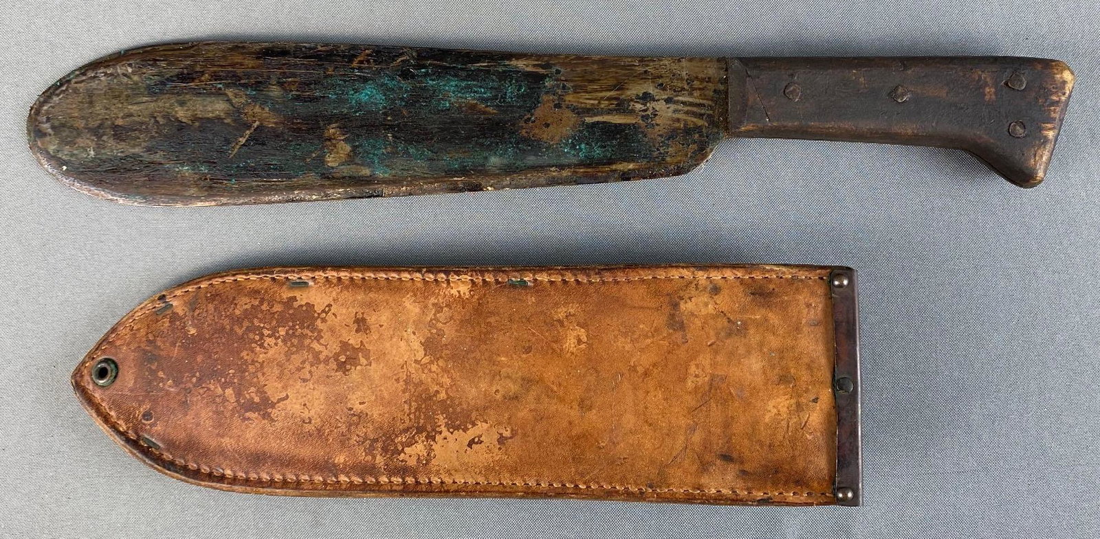 WW2 USMC Medical Corpsman Knife: With Boyt 45 leather sheath, wood handle, blade heavily tarnished with residue, measures 16 1/2in long.