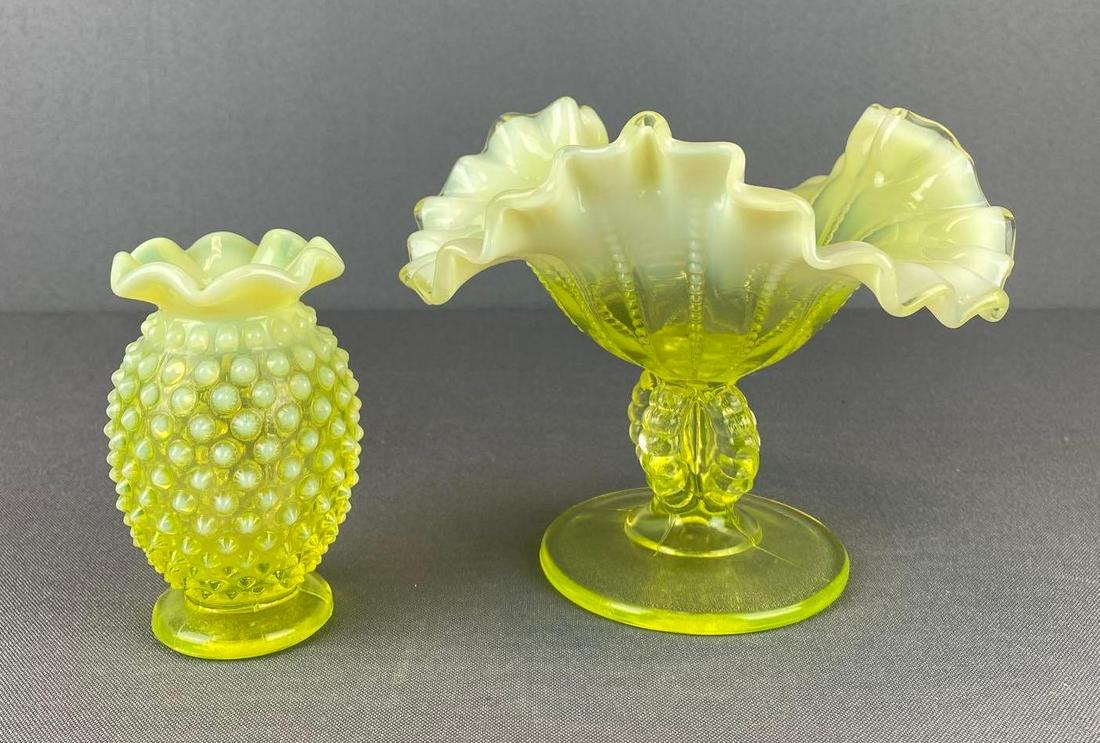 2 Vaseline Glass Items: includes opalescent hobnail vase and ruffle ribbon edge pedestal dish, largest is 5 X 6 inches
