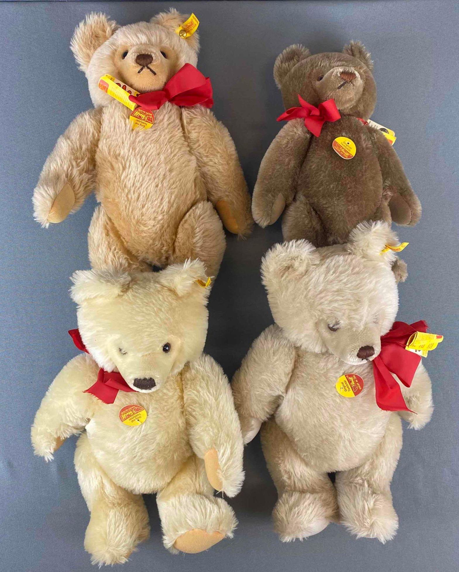 Group of 4 Steiff Bears: Height ranges from approx 13-15 inches.