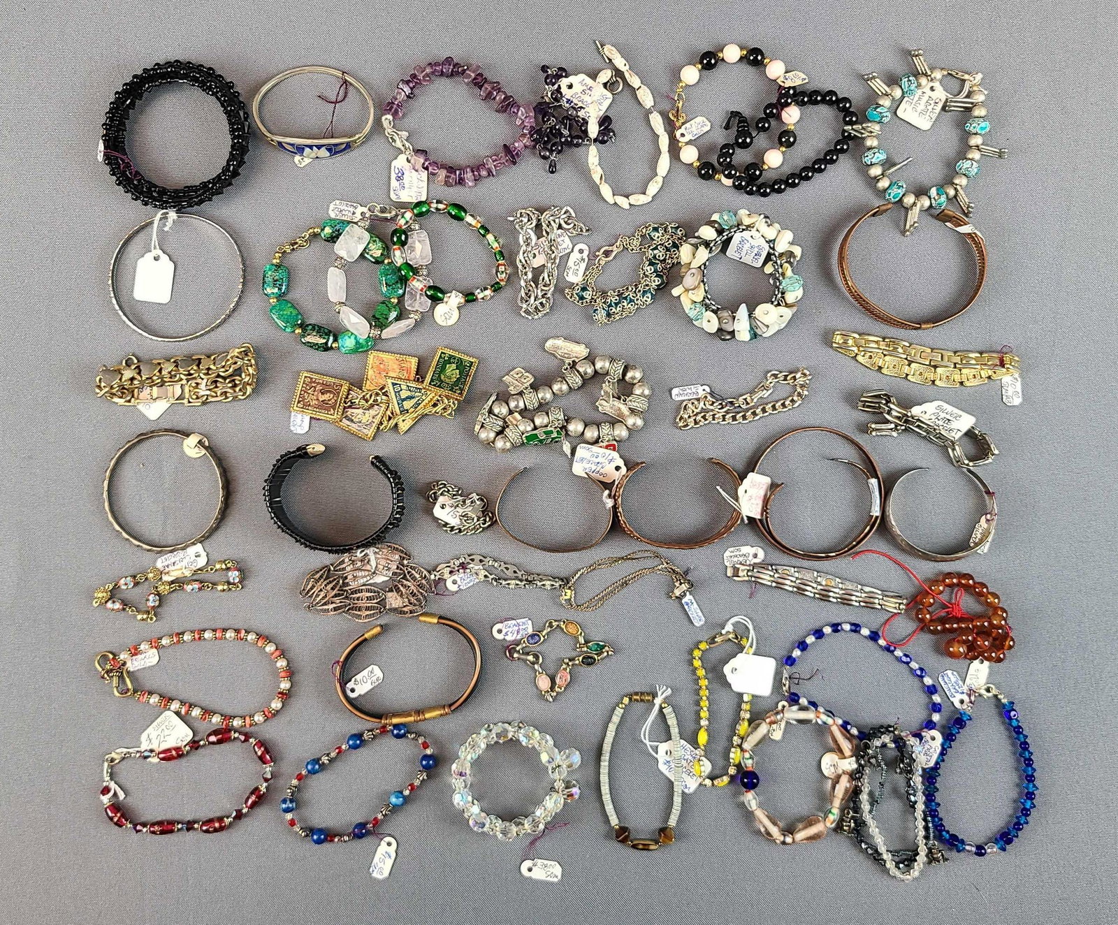 Group of Bracelets: Beaded, stones, copper, and more