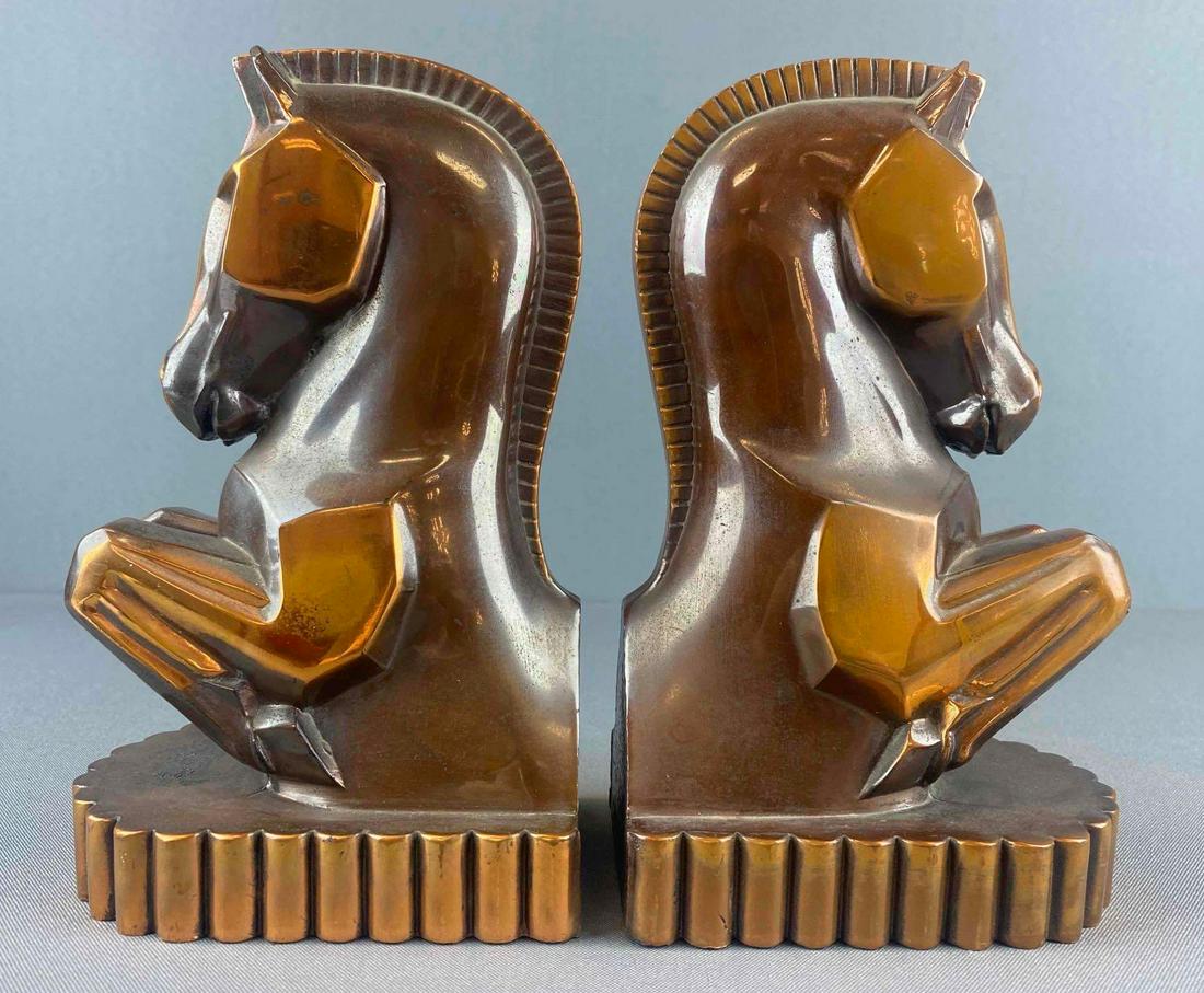 Metal Geometric Horse Bookends: Copper finish. 8 1/2 x 4 x 5 inches.