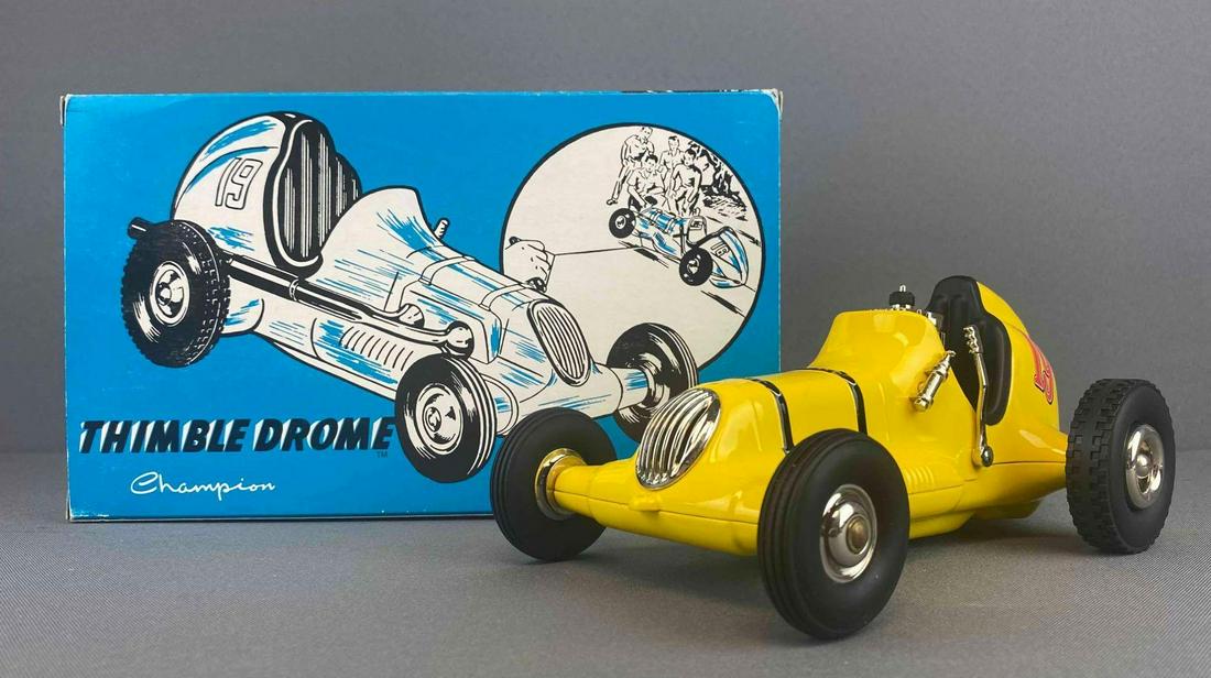 Nylint Thimble Drome Champion Car Reproduction: 1998. Die-Cast. With original box, owners certificate, and COA. No. 1017/5000. 4 1/2 x 9 1/2 x 5 inches.