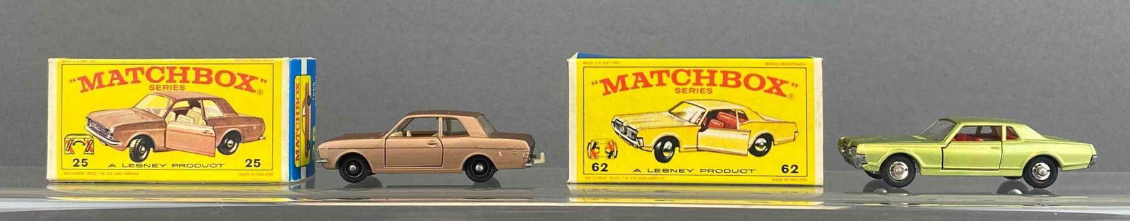 Group of 2 Matchbox No. 25 and 62: Brown and Green. Includes Ford Cortina and Mercury Cougar. A Lesney Product. Black plastic wheels. Original box. Made in England. Die-cast.