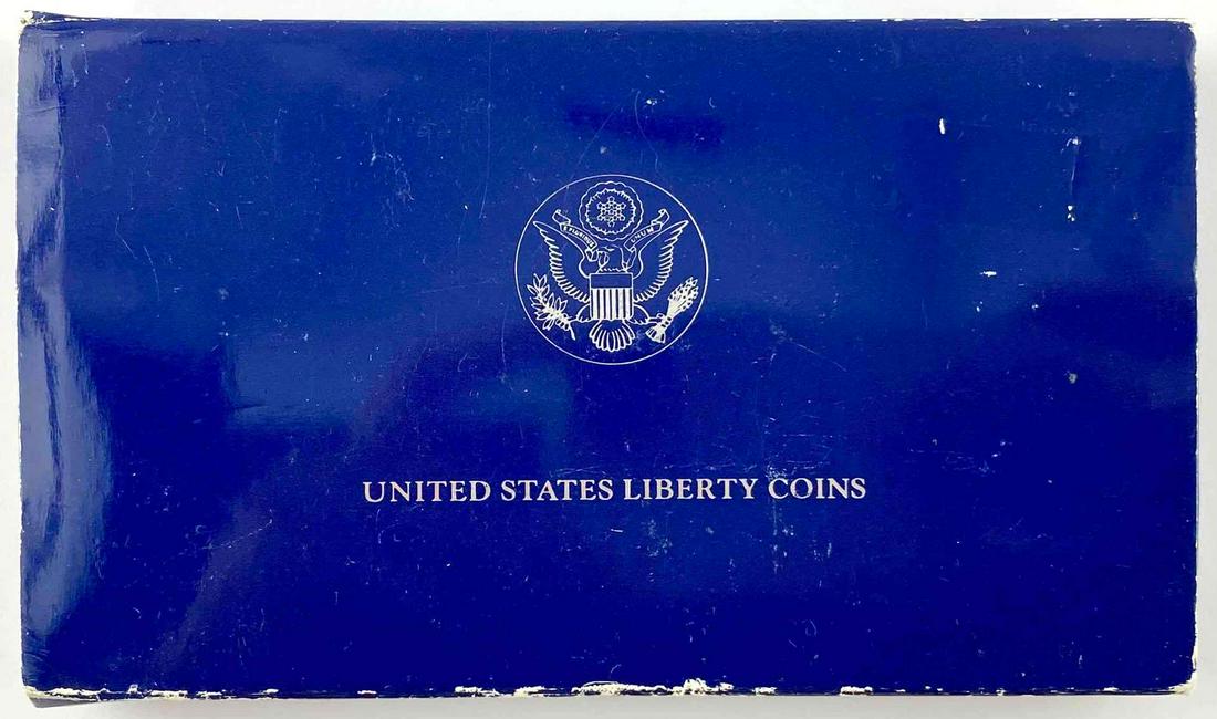 1986 US mint Liberty Silver Dollar and half dollar: original box