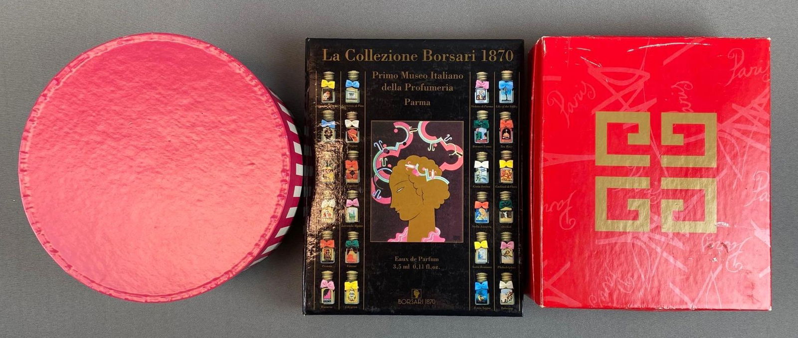 Group of 3 Assorted Miniature Boxed Perfume/Colognes: Some with contents, includes Givenchy, Borsari, Fendi, and more, round box measures 4 1/4 x 8 x 8in.