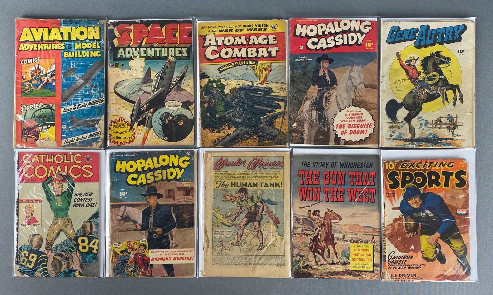 Group of 10 Assorted Golden Age Comic Books: June 1952-Jan 1954, includes Hopalong Cassidy, Gene Autry, Catholic Comics, and more, $.10, bagged and boarded, all with torn covers, pages, missing pieces and more.