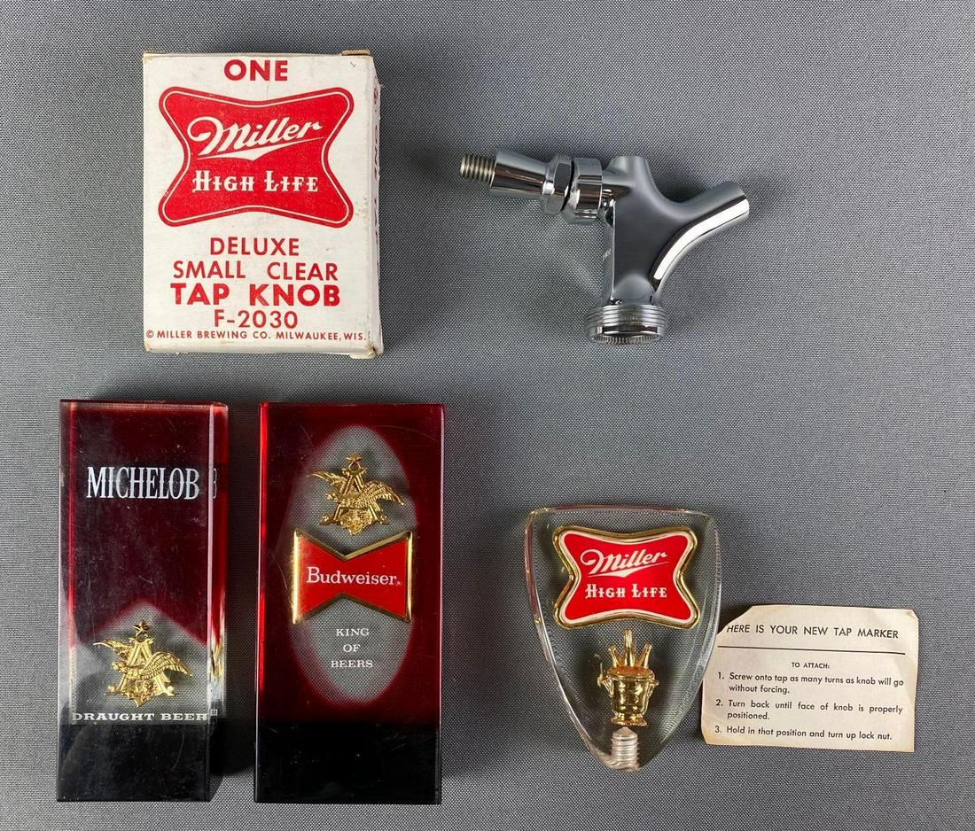 Group of 4 Advertising Liquor Tap Knobs: Includes Michelob, Budweiser, Miller High Life, and more. Largest measures 5 1/2 x 2 1/2 inches.
