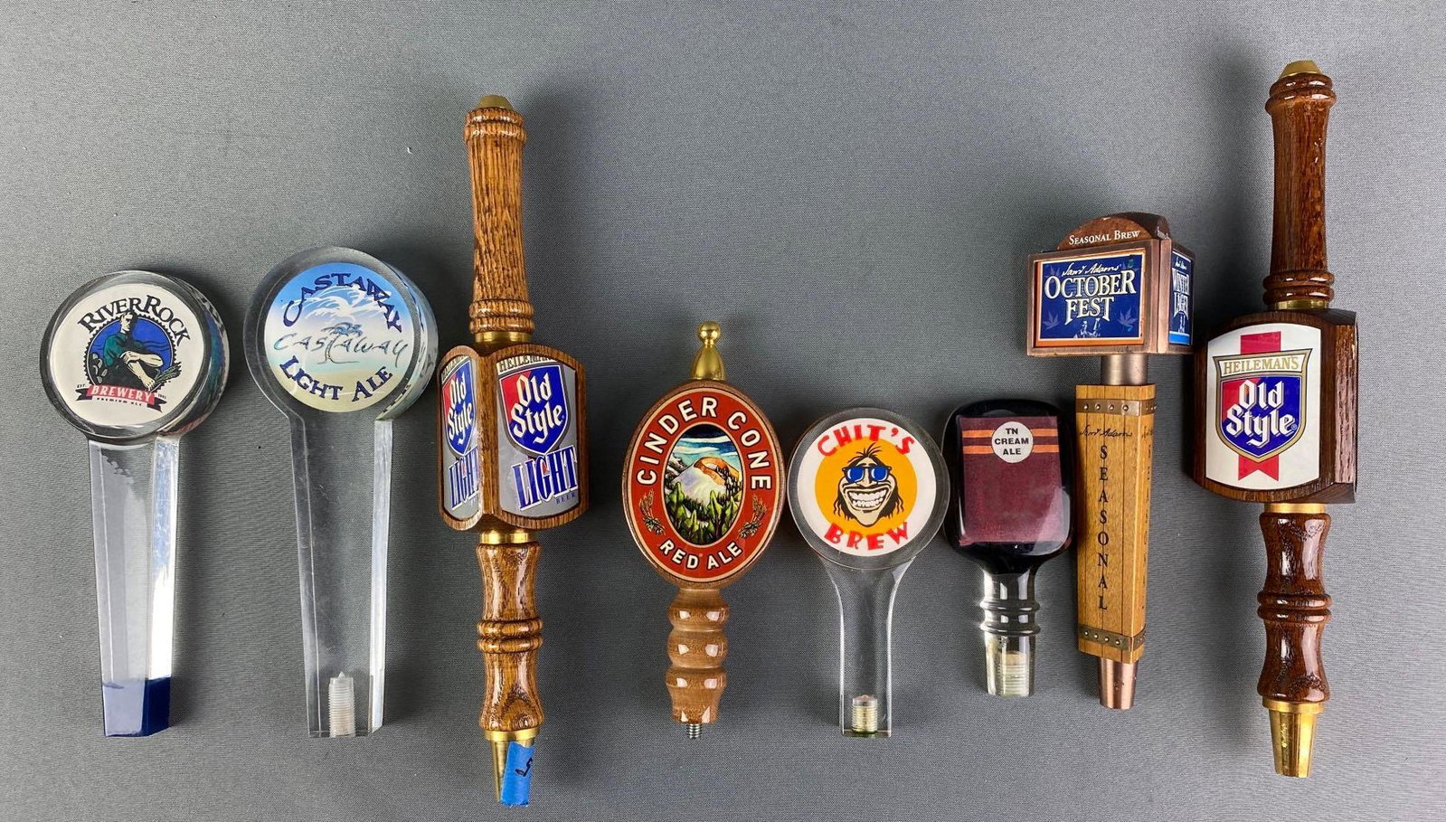 Group of 8 Assorted Beer Tappers: Includes River Rock, Cinder Cone, Hellmans Old Style, and more. Largest measures 13 1/4 inches