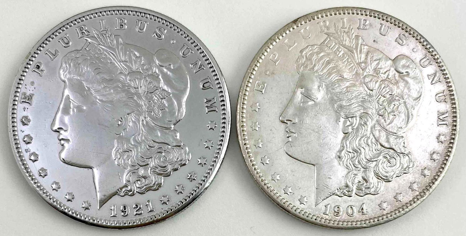 Group of 2 US Silver Morgan Dollars (1 of 2)