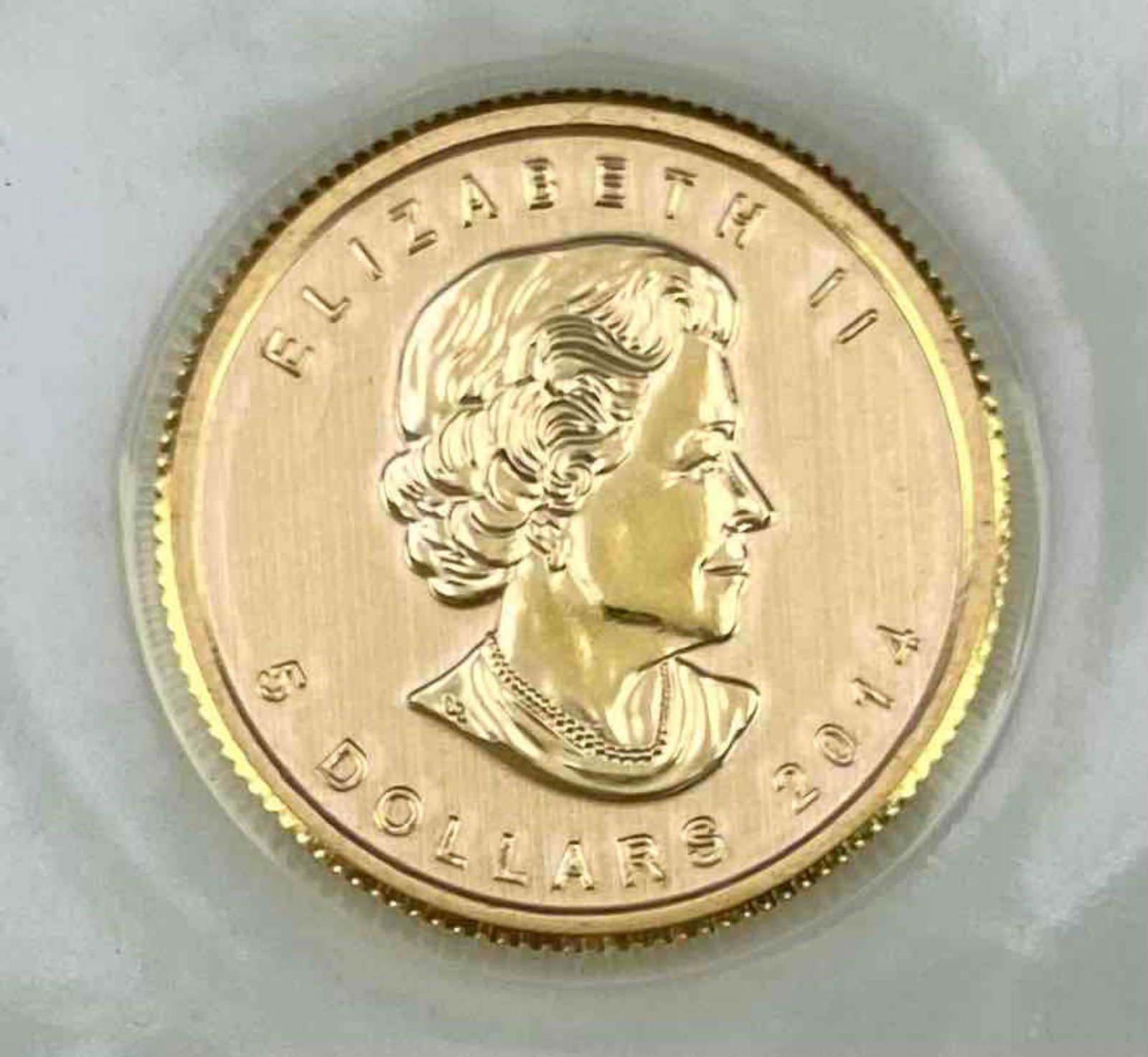 2014 1/10 oz Gold Canada Maple Leaf .9999 fine gold (1 of 2)