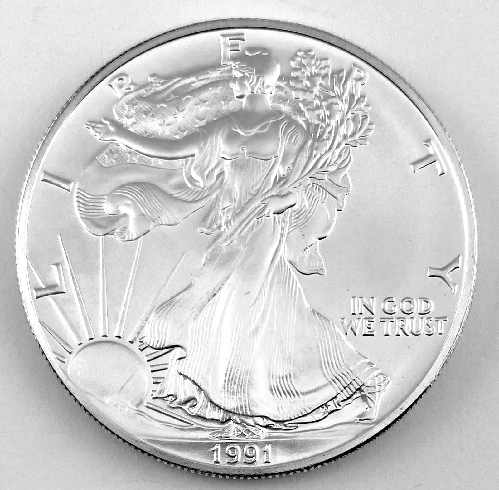 1991 US Mint American Silver Eagle 1 oz .999 fine silver round (1 of 2)