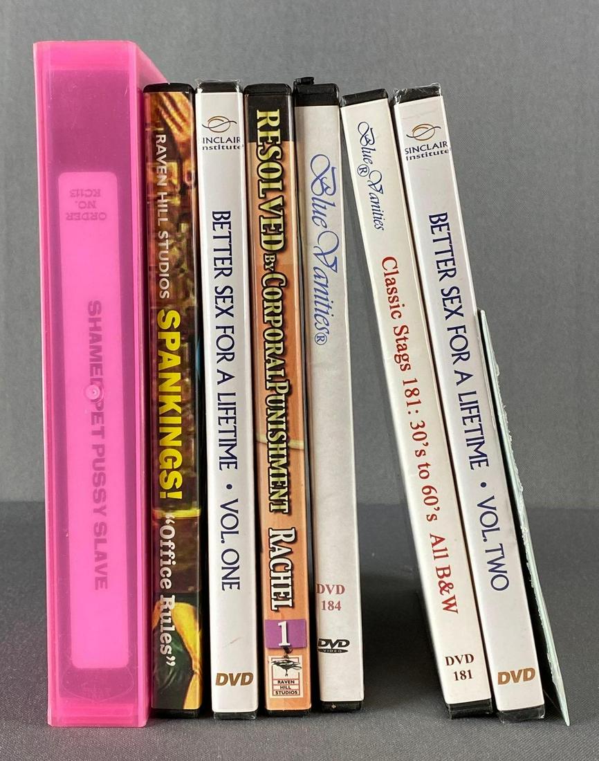 Group of 8 Assorted Adult DVD and VHS Tapes: Untested.