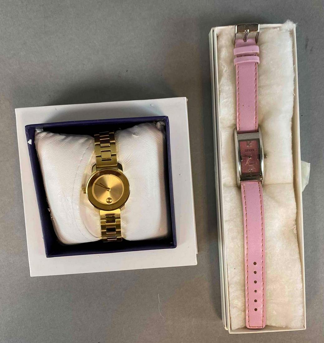 Group of 2 Womens Wrist Watches: includes a Pink Gucci Watch and a Gold movado