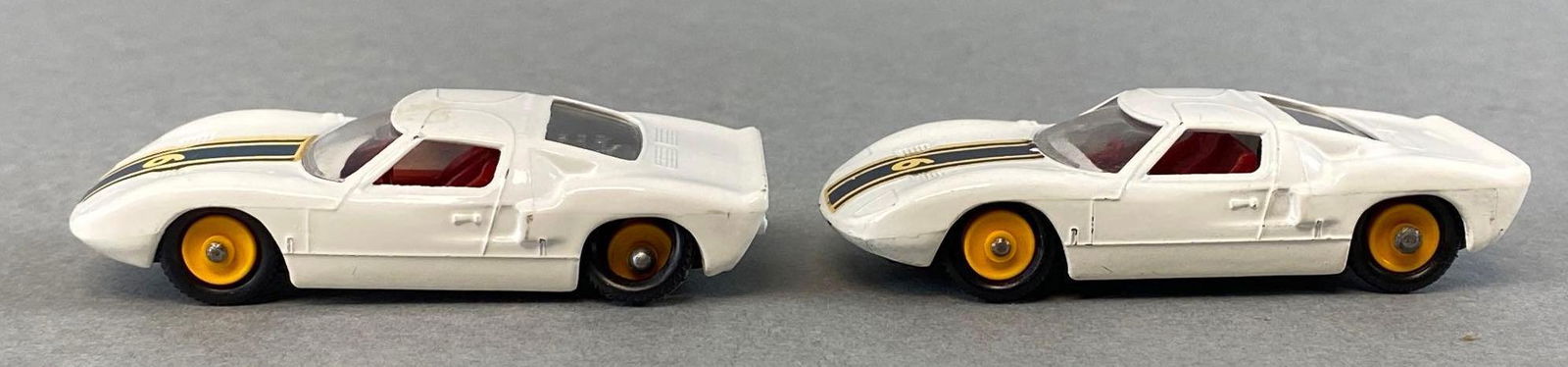 Group of 2 Matchbox No. 41 Ford GTs: Both white. A Lesney Product. Made in England. Die-cast.
