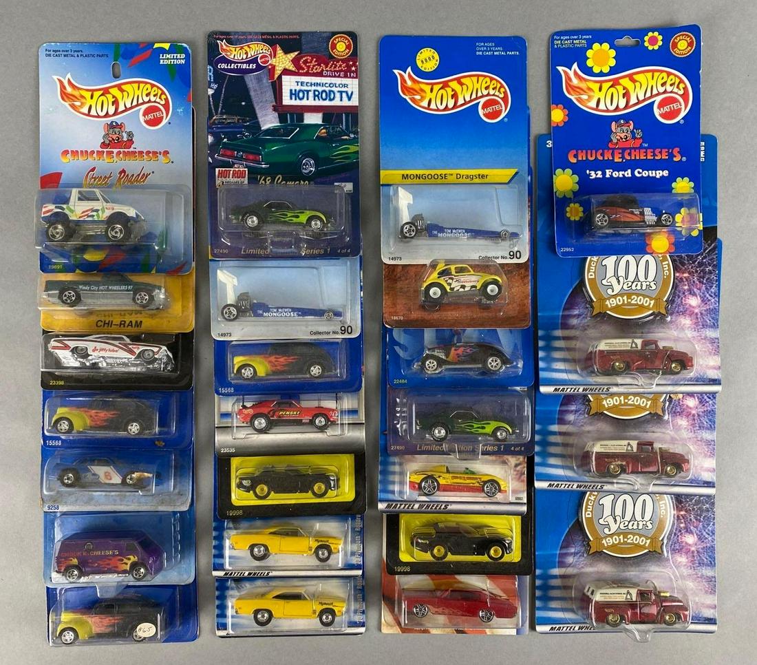 Group of 20+ Assorted Hot Wheels Die-Cast Vehicles: Includes Chuck E Cheese 1932 Ford Coupe, 1986 Camaro, Mongoose Dragster, and more. Mattel. In original packaging. Largest packaging measures 7 1/2 x 5 1/4 x 1 1/2in.