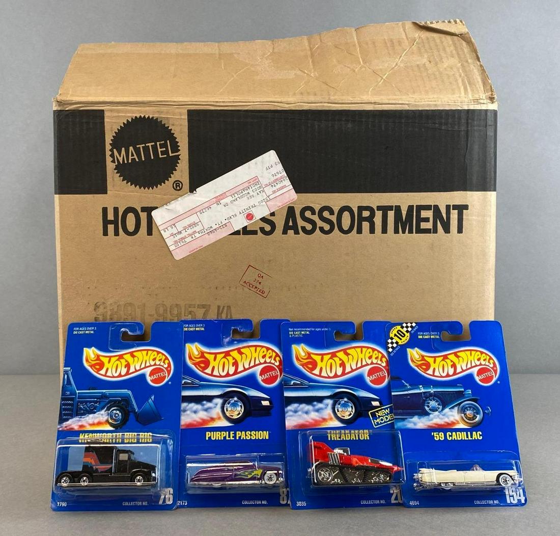Partial Factory Box of Hot Wheels Die-Cast Vehicles: Mattel. Includes No. 76 Kenworth Big Rig, No. 87 Purple Passion, No. 205 Treadator, No. 154 1959 Cadillac.