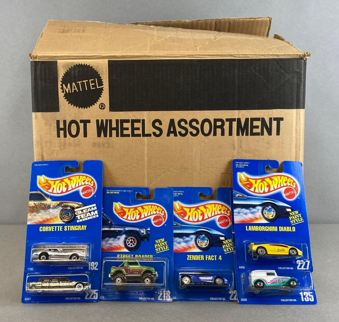 Partial Factory Box of Hot Wheels Die-Cast Vehicles: Mattel. Assorted cars. Includes No. 218 Street Roader, No. 225 Limozeen, No. 192 Corvette Sting Ray, and more. Box measures 13 1/2 x 16 1/2 x 10in.