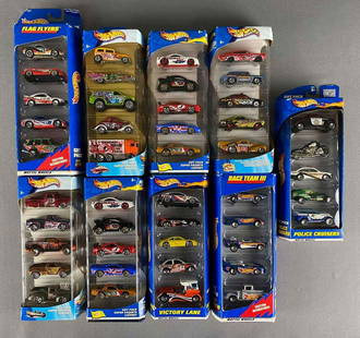 Group of 9 Hot Wheels Gift Packs: Includes Police Cruisers, victory lane, flag flyers and more, like new in original packaging,Die-Cast