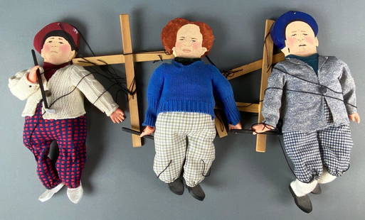 Set of 3 Three Stooges Golfing Marionette Puppets: Painted wood heads and feet, vinyl hands, and cloth bodies. Includes Larry Moe and Curly. Each figure measures 16 x 9 1/2 x 3 1/2in laying down.