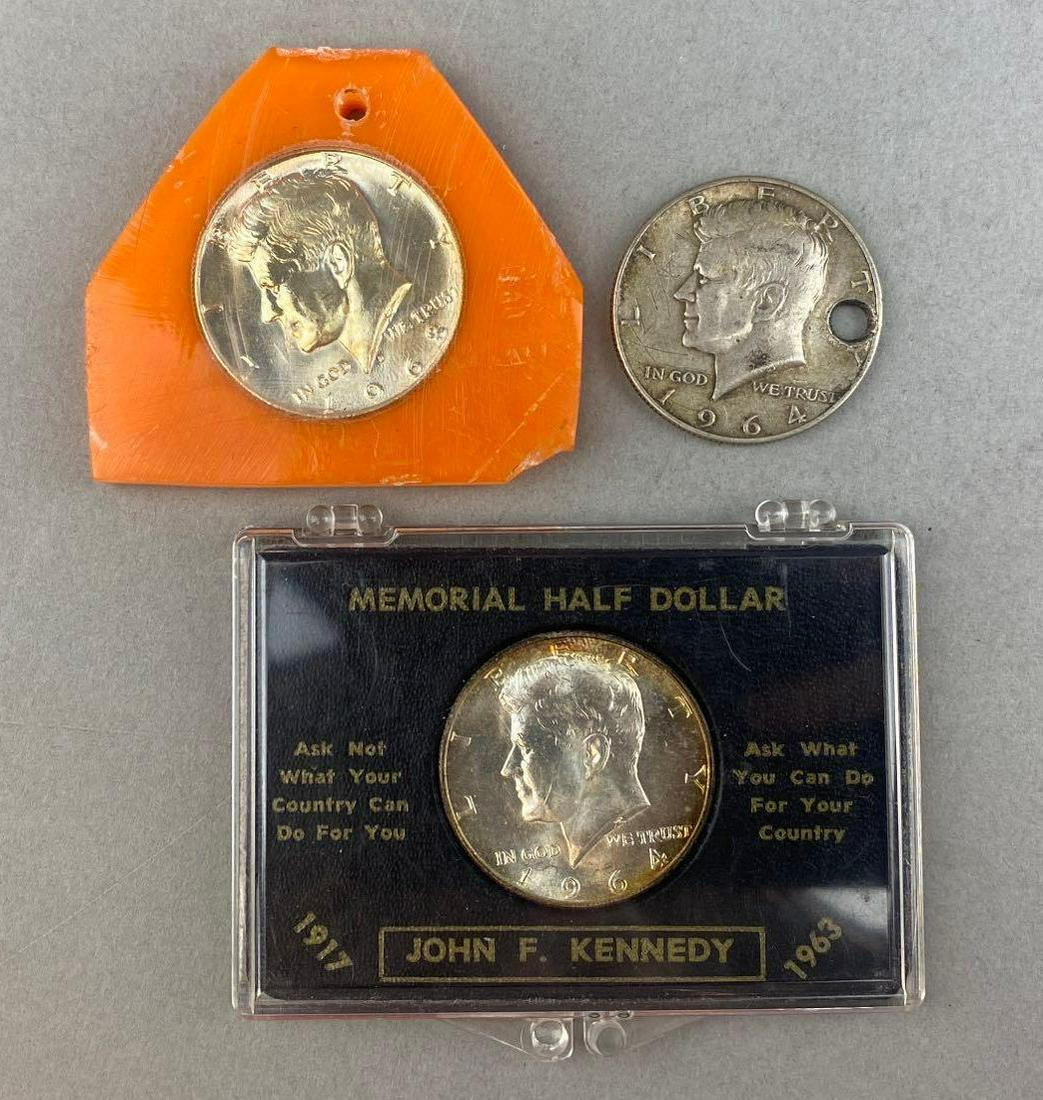 Group of 3 Silver Kennedy Half Dollars: 1968, 1964 D, and 1964 D.