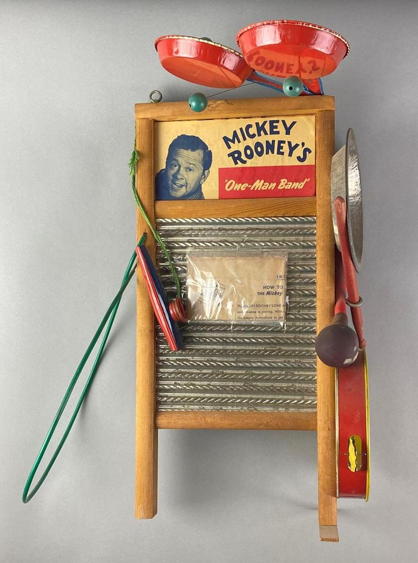Mickey Rooneys One-Man Band Toy: Includes instructions. Board measures 18 x 8 inches, not measuring instruments on side. Missing 1 leg base.