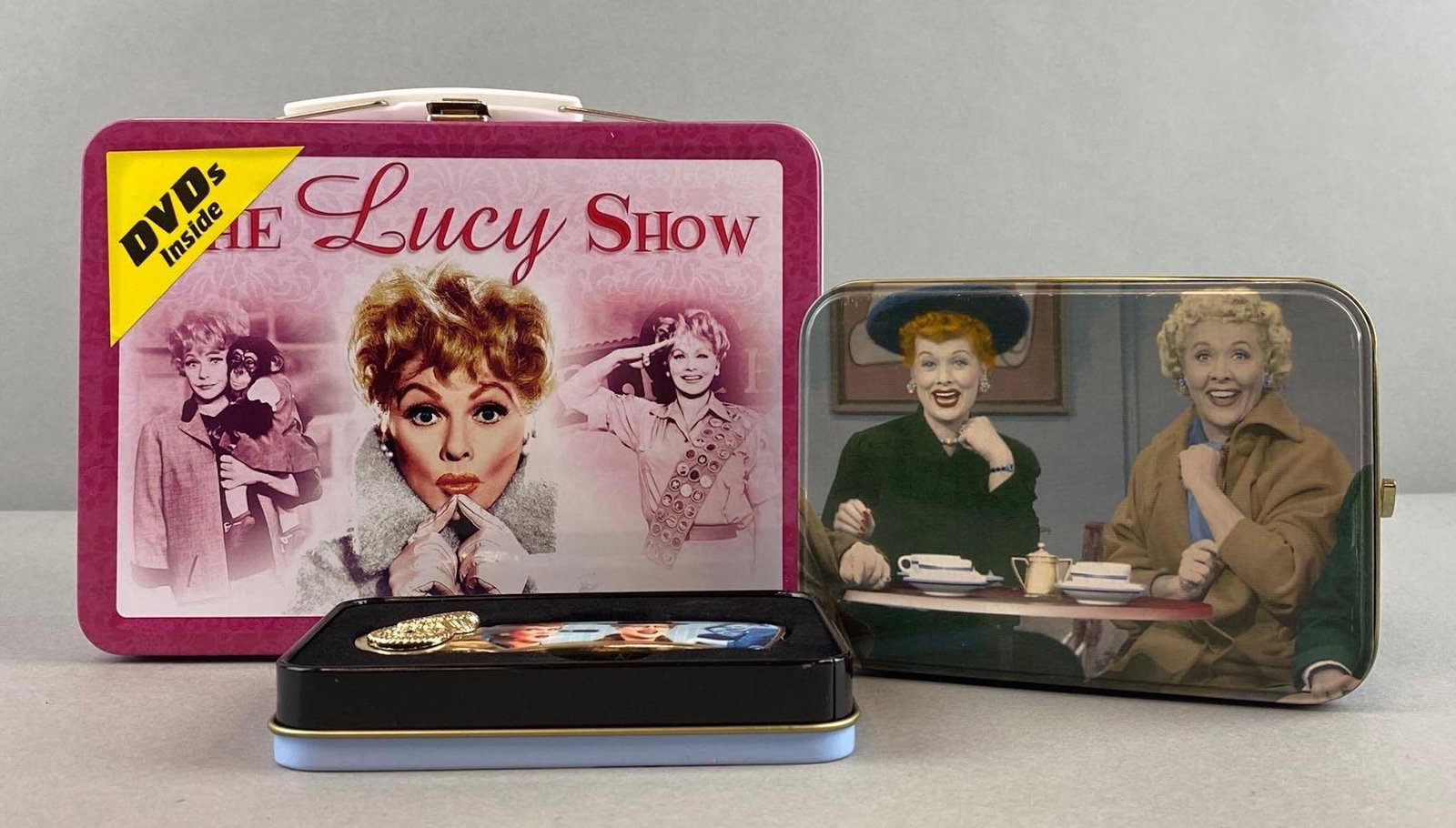Group of 3 I Love Lucy Items: Includes lunchbox, music box, and knife. Lunchbox measures 6 x 8 x 3 inches.