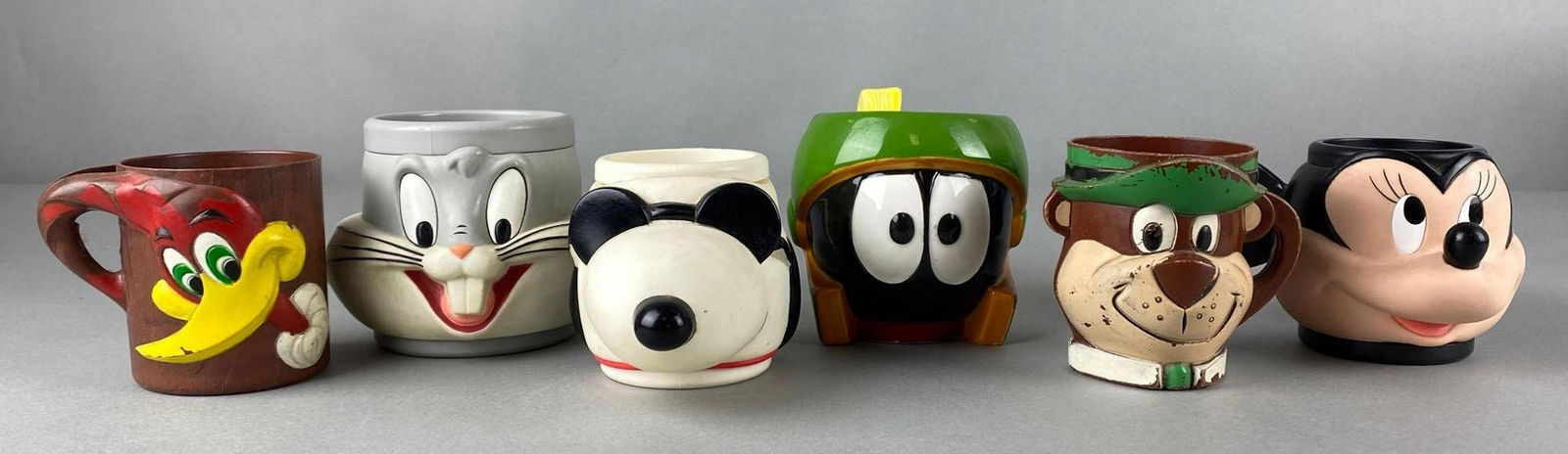Group of 6 Assorted Character Coffee Mugs: Includes Marvin Martian, Minnie Mouse, Bugs Bunny, and more, Largest measures 4 x 5 x 5in.