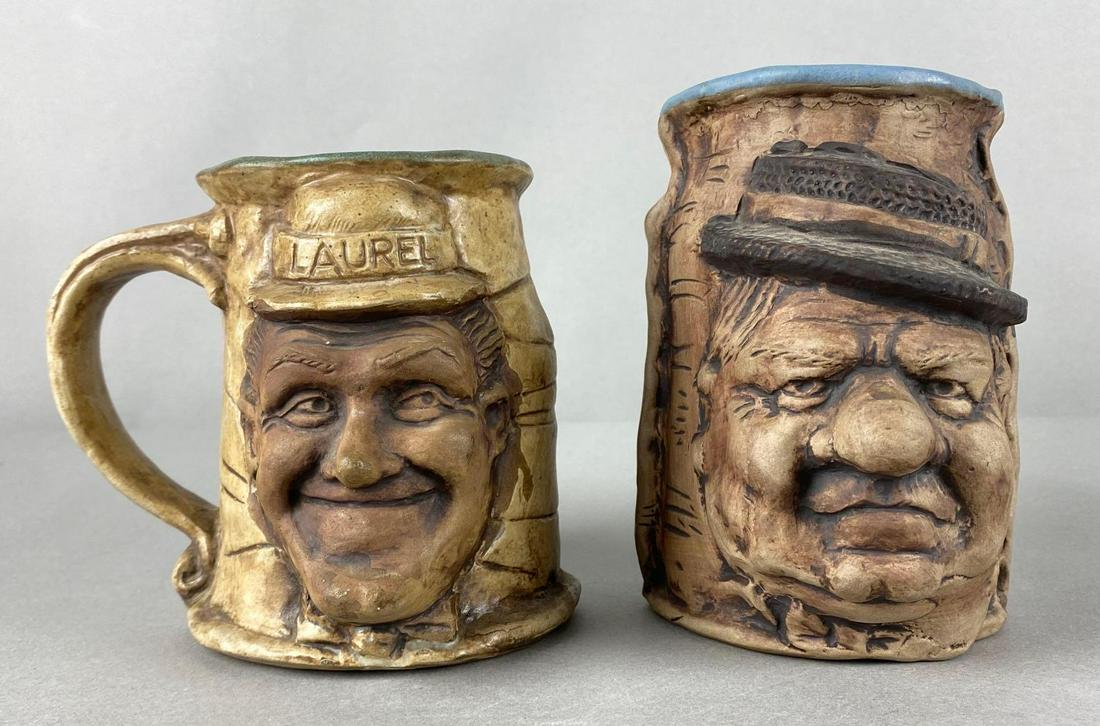 Group of 2 Julie Rumph Comedian Pottery Items: Includes Laurel and Hardy Mug, and WC Fields Vase, Makers mark on base, Tallest measures 5 1/2 x 5 1/2 x 3 3/4in.