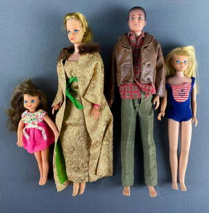 Group of 4 Mattel Barbie Fashion Dolls: 1960, 63, 65 and 66. largest measures 12 inches tall