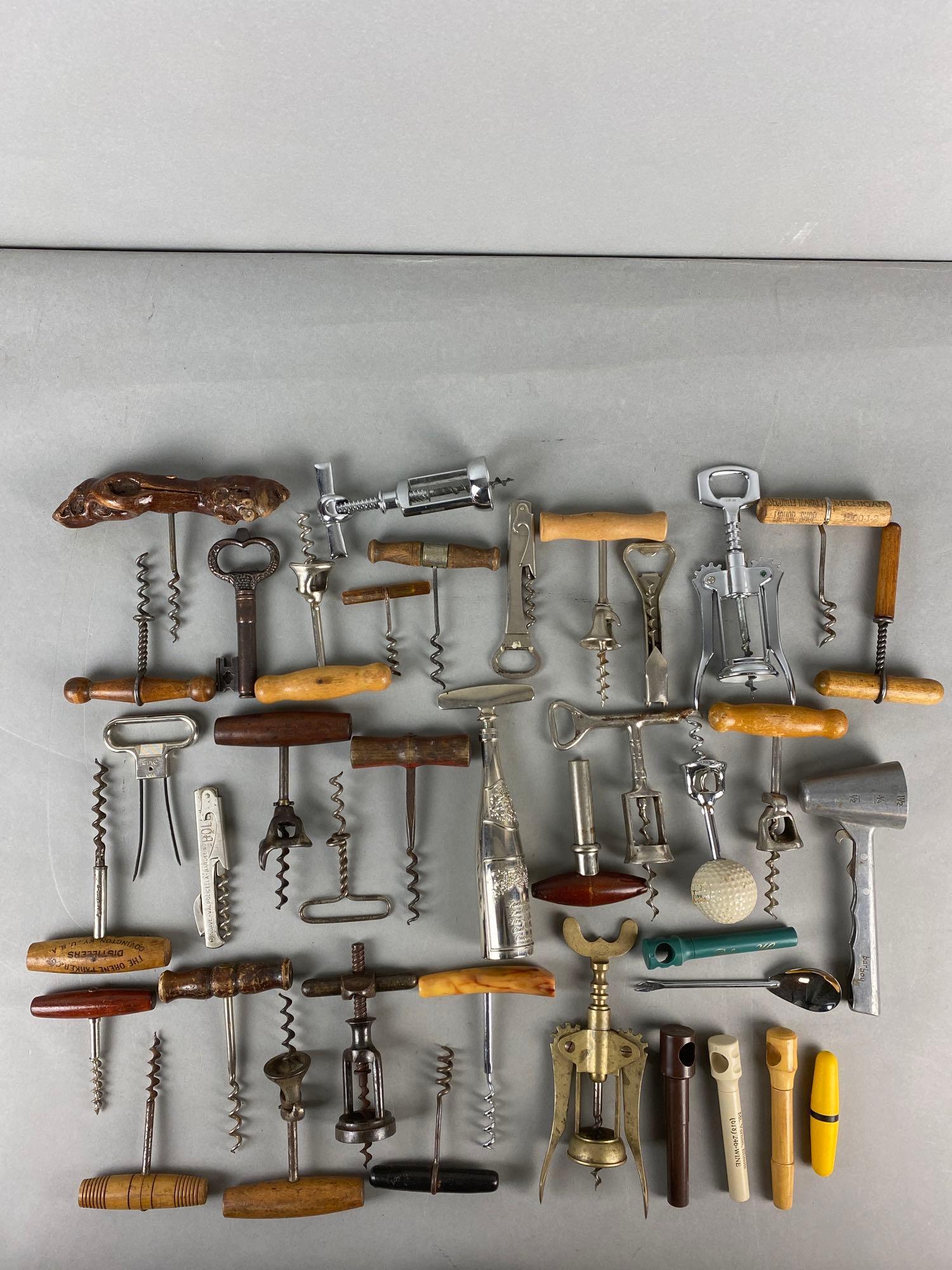 Group of Assorted Cork Screws/Bottle Openers: various shapes and designs, largest measures 7 X 1 1/2 inches