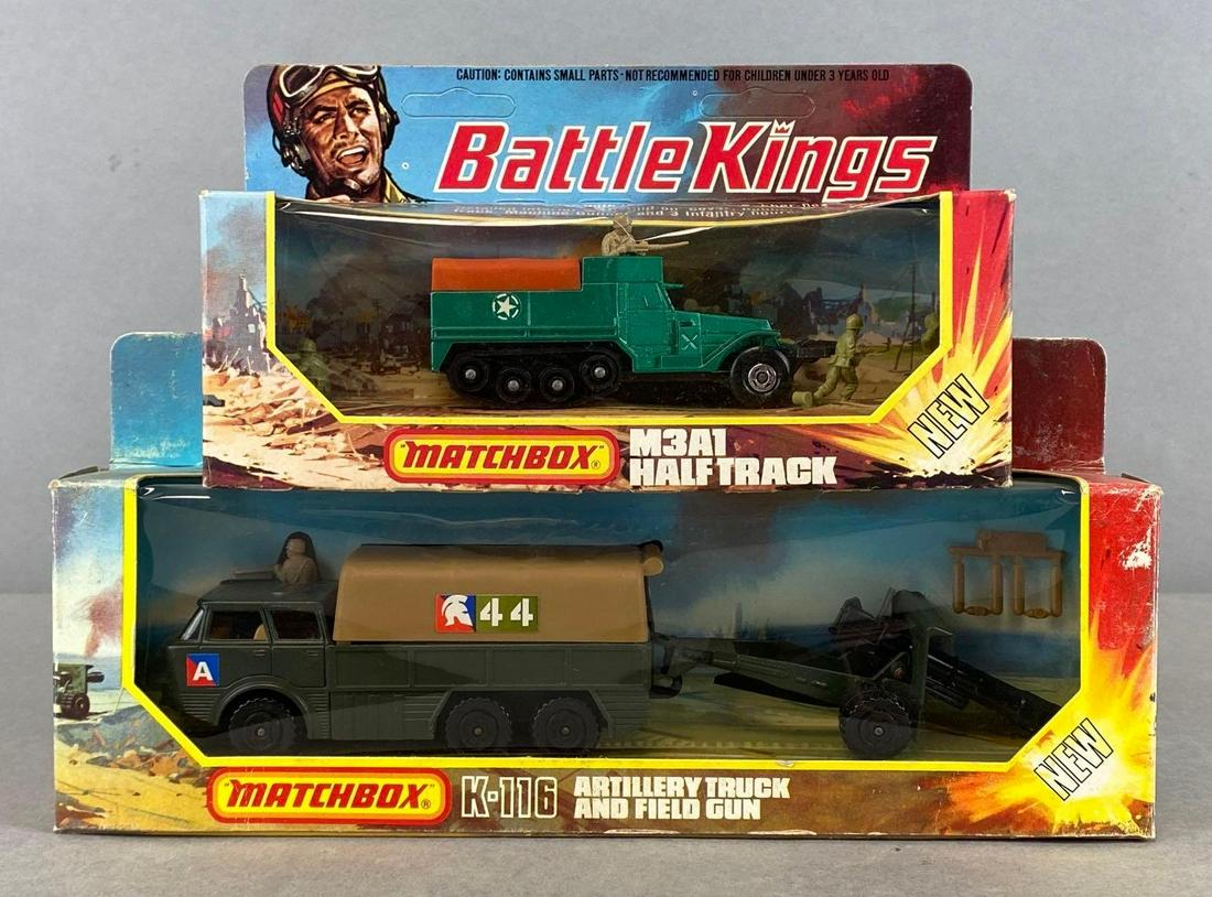 Group of 2 Matchbox Battle Kings Die-Cast Vehicles: A Lesney Product. Includes K-108 M3A1 Half Track, and K-116 Artillery Truck and Field Gun. In original packaging. Largest packaging measures 4 1/2 x 10 x 2in.