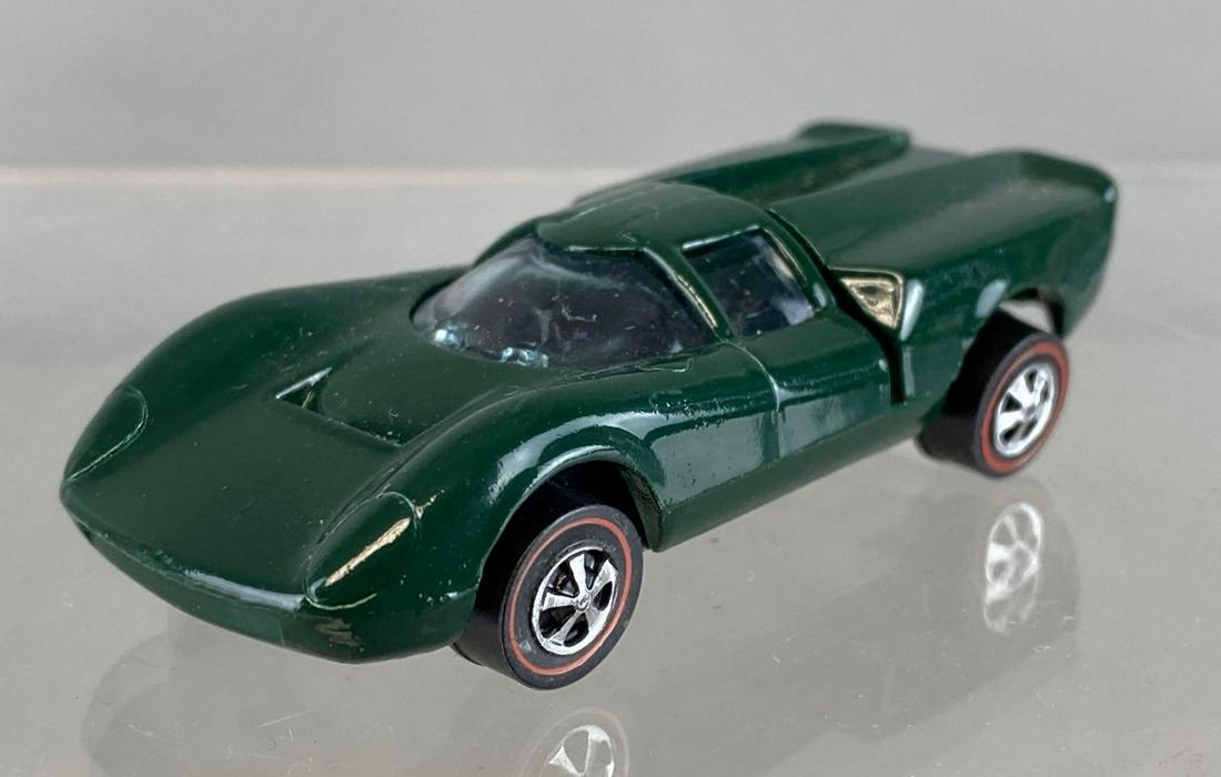 Hot Wheels Redline Lola GT70: 1968. Die-Cast. Red Line Tires. Green Body.