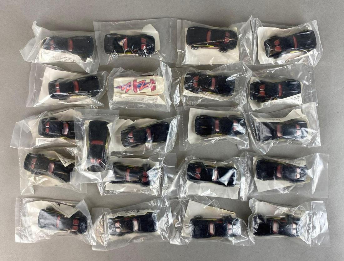 Group of 20+ Assorted Hot Wheels Die-Cast Vehicles: 1991. Mattel. Factory sealed. In original packaging. Packaging measures 4 x 2 1/4in.