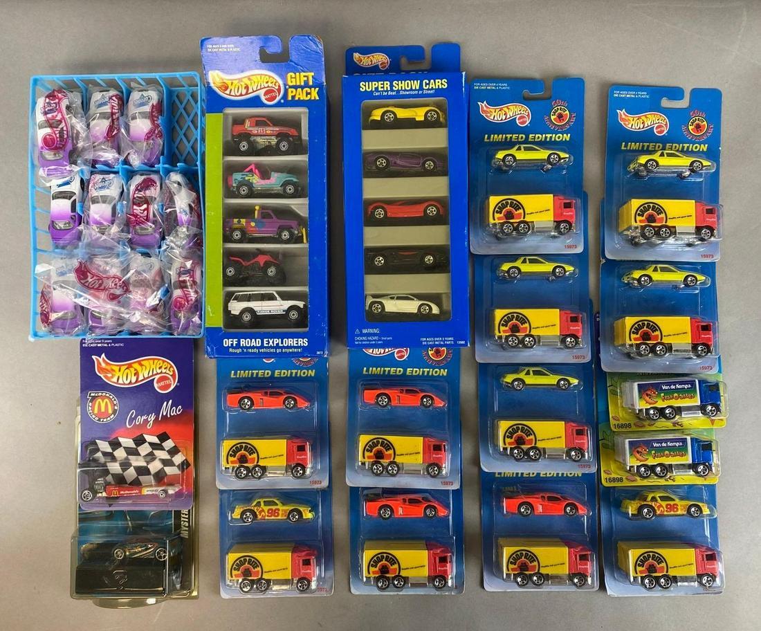 Group of 20+ Assorted Hot Wheels Die-Cast Vehicles: Includes gift packs, Shop Rite, McDonalds, Coronet, Fish-O-Saurs, and more. In original packaging. Largest packaging measures 11 1/2 x 4 1/2 x 1 3/4in.