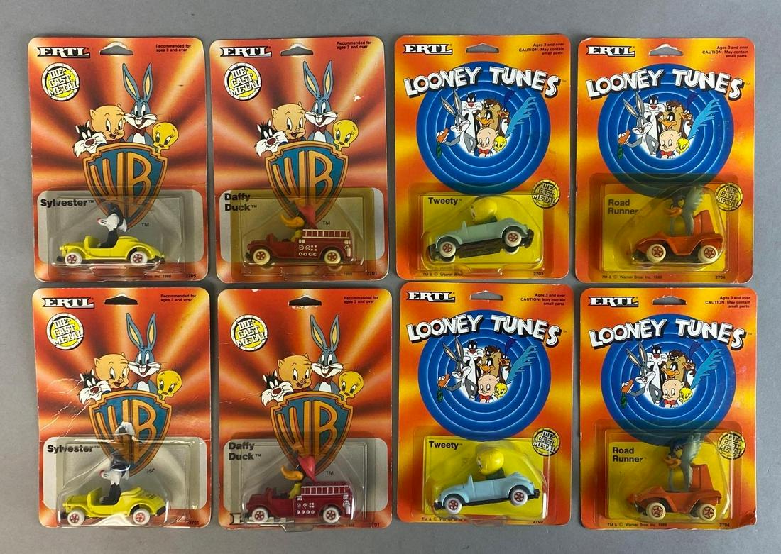 Group of 8 ERTL Looney Tunes Die-Cast Vehicles: 1988-89. Includes Sylvester, Daffy Duck, Tweety, and Road Runner. In original packaging. Packaging measures 7 x 5 x 1 1/4in.