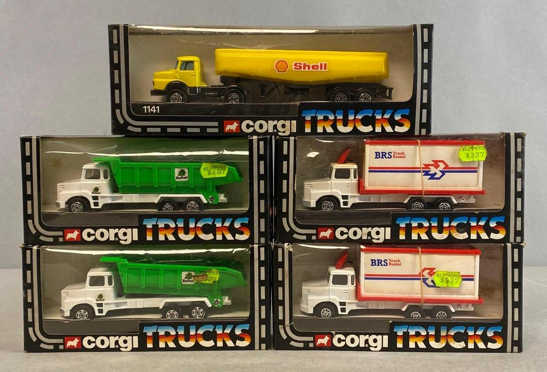 Group of 5 Corgi Die-Cast Trucks: The Mettoy Co. 1983. Includes No. 1141 Shell, No. 1152 Barratt , and No. 1149 BRS Truck Rental. In original packaging. Largest packaging measures 3 1/4 x 9 3/4 x 2in.