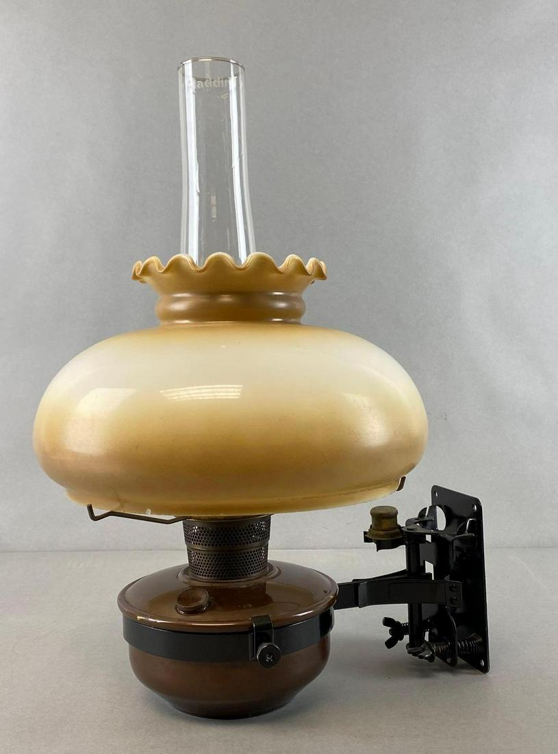 Aladdin Brown Ombre Ruffle Oil Lamp Sconce: Fitter measures 9in, Lamp measures 19 x 14 x 11in.