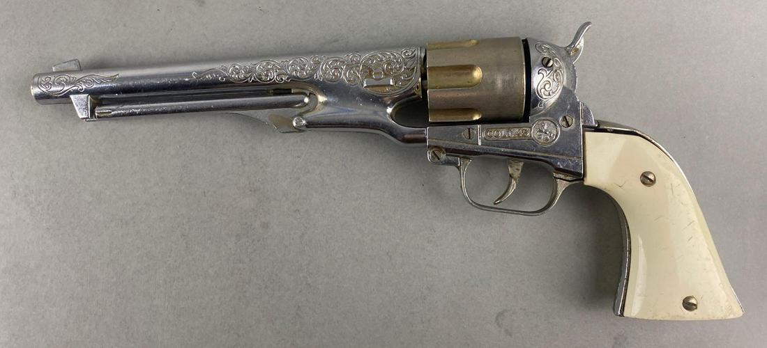 Hubley Colt 45 Die-Cast Cap Gun: Trigger Fires but Cylinder Does Not Rotate. Made in USA. 5 1/2 x 13 1/2 inches