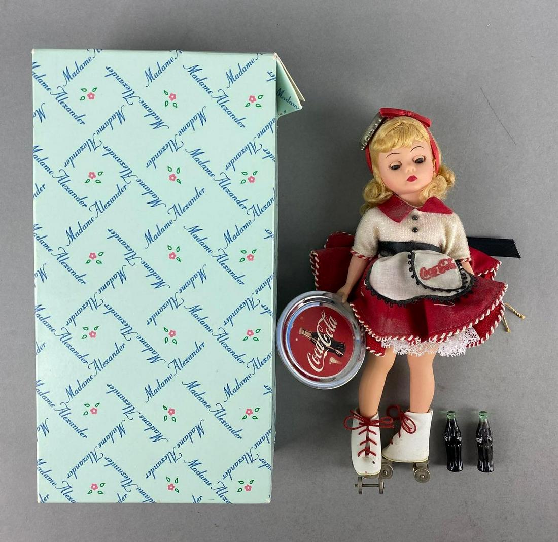 Coca-Cola Advertising Carhop Doll: Porcelain. Madame Alexander doll club. Tray glued to hand . Doll measures 10 inches tall.