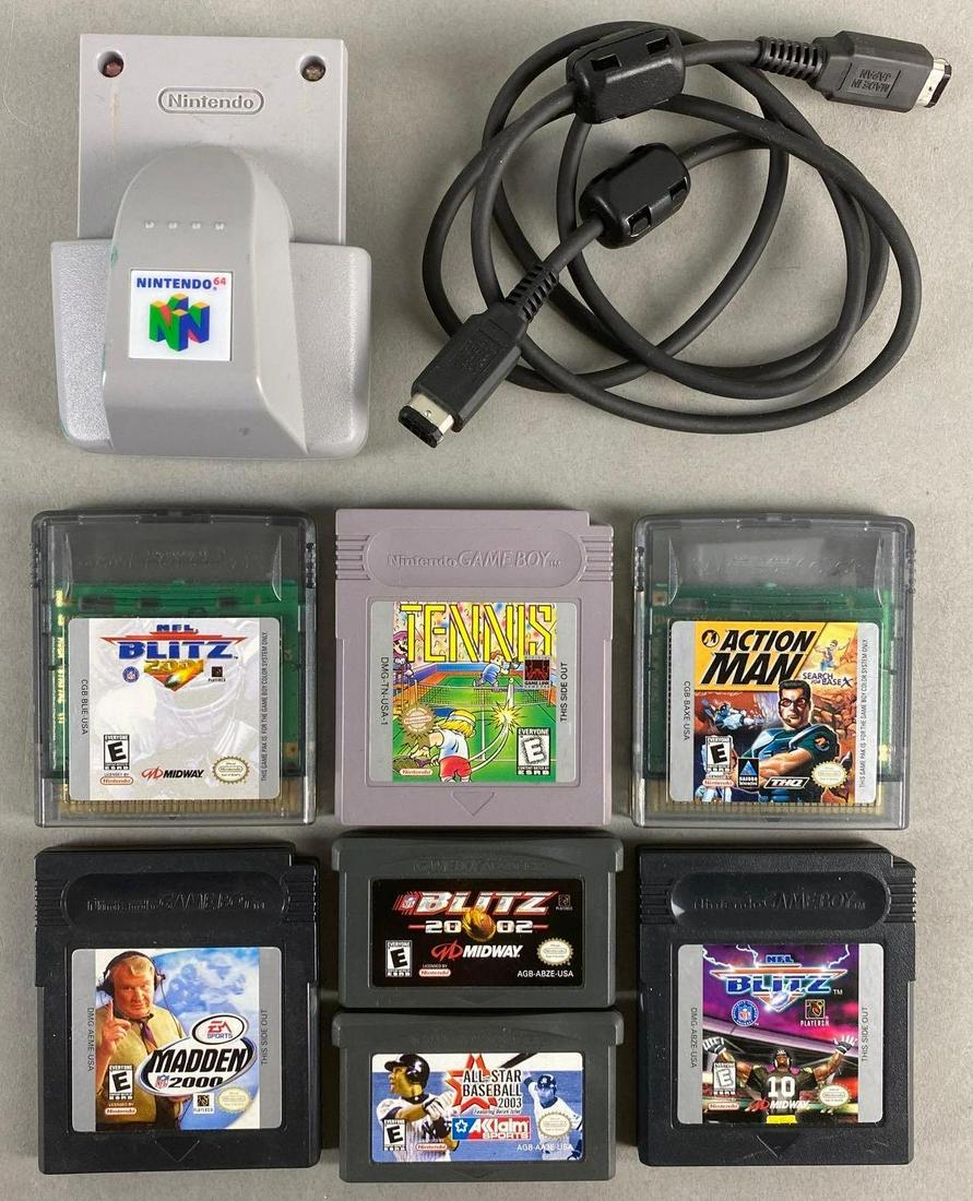 Group of 7 Nintendo Gameboy Cartridges with Nintendo 64 Ruble Pak: Includes NFL Blitz, Tennis, Action Man and more. Rumble Pak measures 3 X 2 1/4 X 1 3/4 inches